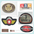 sport style embossed letter a b c cute bear shape rubber garment label